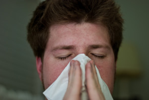 man Sneezing